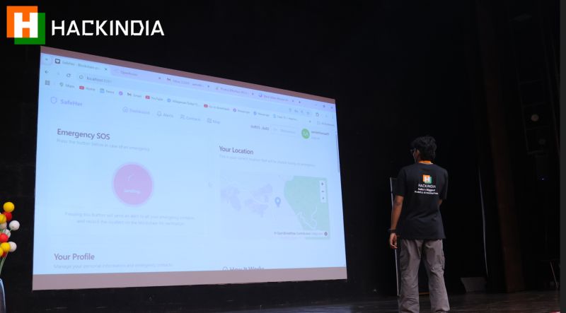 SafeHer running on the pitch screen at HackIndia Spark 5, showing the Emergency SOS screen